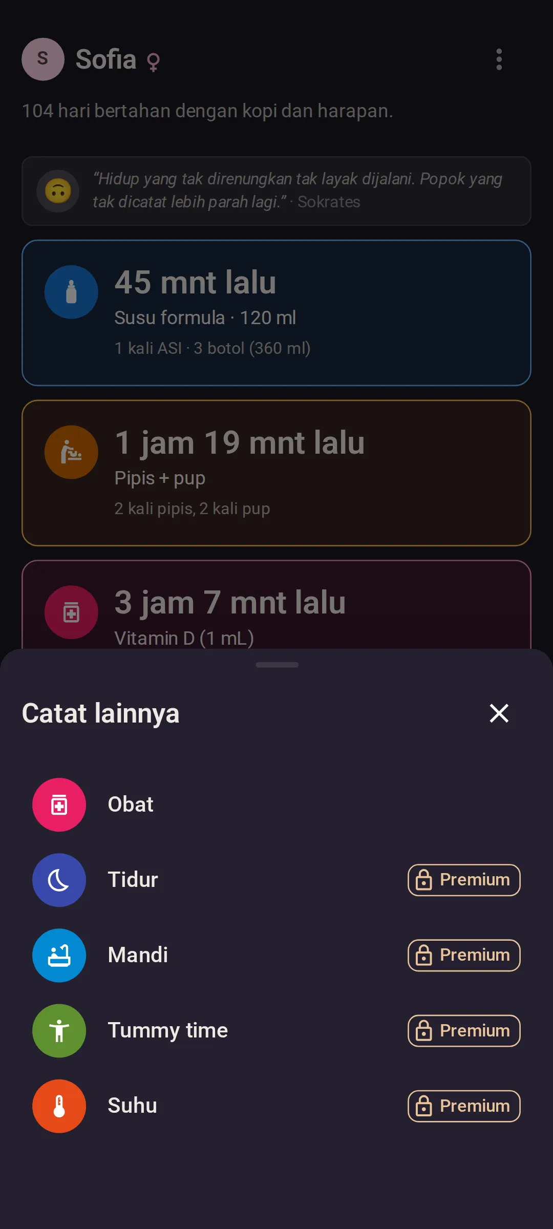 Lembar “Catat lainnya” terbuka di atas layar “Hari ini”, dengan Obat di baris pertama, lalu Tidur, Mandi, Tummy time, dan Suhu, empat terakhir masing-masing dengan label Premium dan ikon gembok di paket gratis.