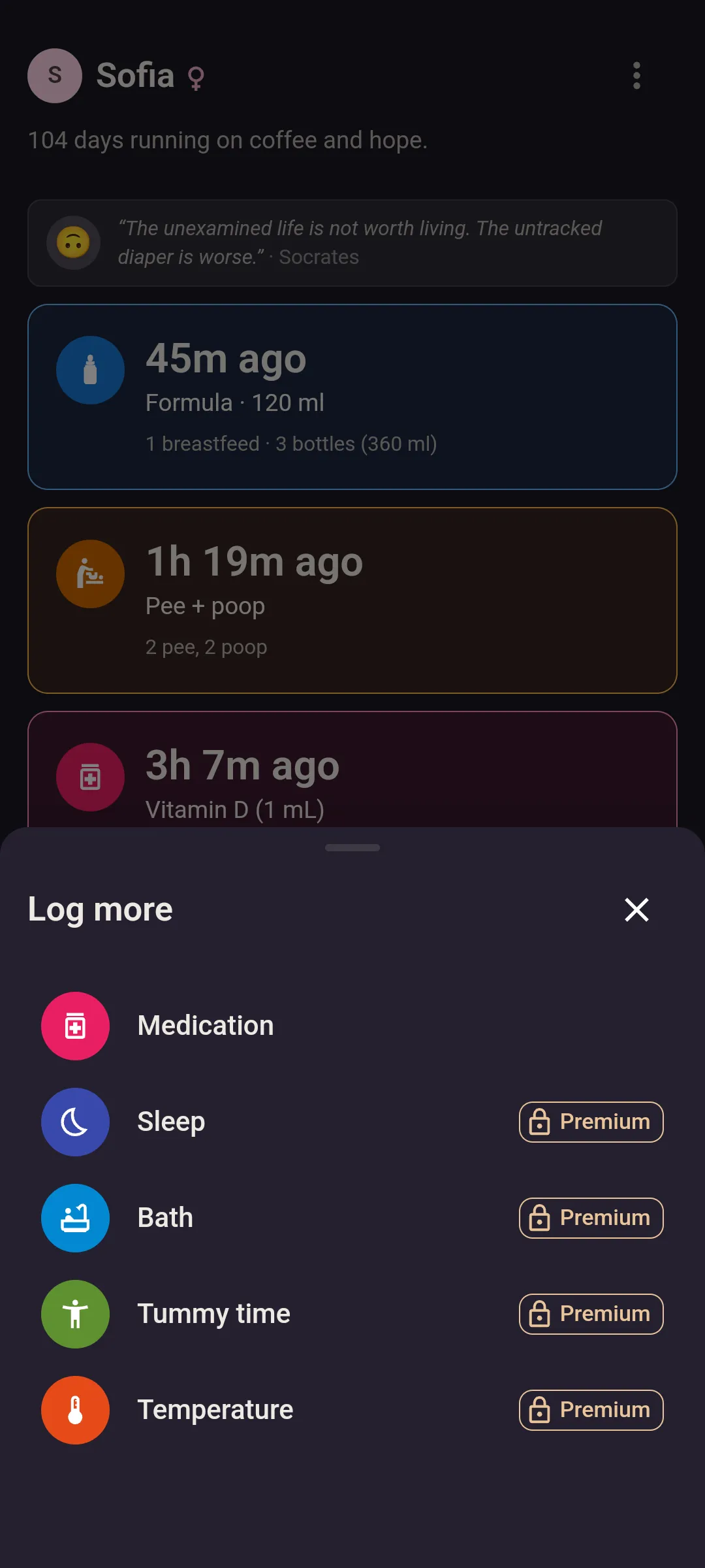 The Log more sheet open over the Today screen, with Medication as the first row, then Sleep, Bath, Tummy time and Temperature, the last four each carrying a Premium tag with a lock on the free plan.