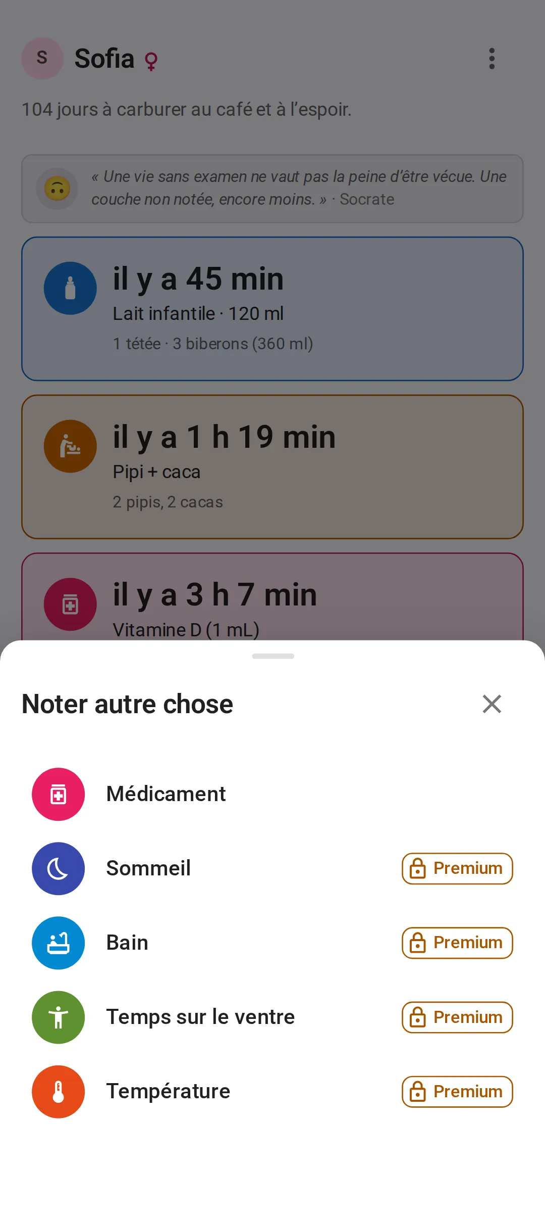 Le menu Noter autre chose sur l’écran Aujourd’hui : Médicament en premier, puis Sommeil, Bain, Temps sur le ventre et Température, ces quatre derniers avec une étiquette Premium et un cadenas avec l’offre gratuite.